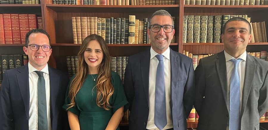 The three newly admitted partners with Managing Partner, Michael Psaila